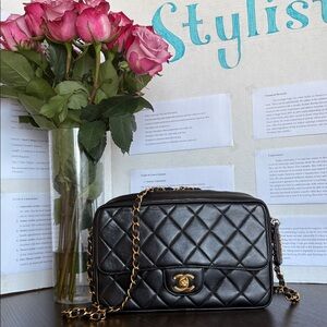 CHANEL Black Quilted Crossbody with Gold Accent